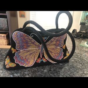 Fully beaded butterfly handbag.